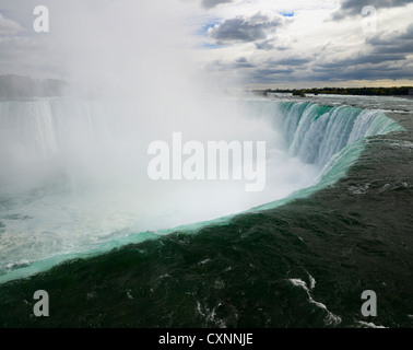 Mist rising out of the curve of Horseshoe Falls Niagara Falls waterfall on the Niagara river Ontario Canada Stock Photo