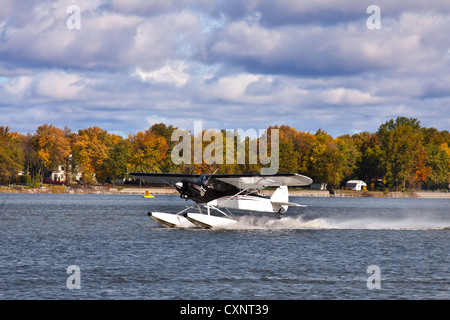 Take-off hydroplane in a fall landscape Stock Photo