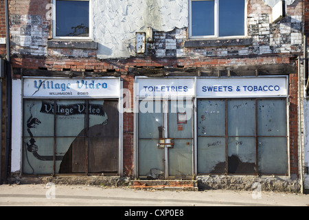 A derelict shop unit in the mining village of Maltby South Yorkshire. Stock Photo