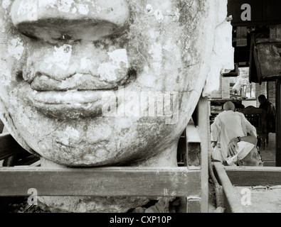 Strange Buddha art sculpture in Wat Jedlin in Chiang Mai in Thailand in Far East Southeast Asia. Buddhist Buddhism Portrait Portraiture Bizarre Travel Stock Photo