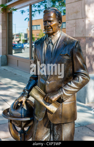 Statue of George Bush Sr, one of lifesize bronze statues of US presidents on street corners in Rapid City, South Dakota, USA Stock Photo