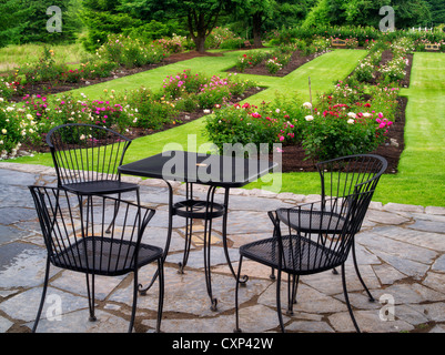 Table and chairs. Heirloom Gardens. St. Paul, Oregon Stock Photo