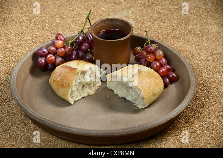 Bread, grapes and wine as Communion symbols Stock Photo