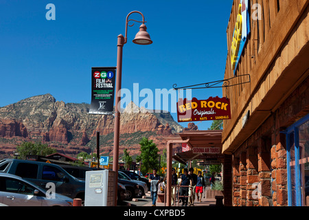 Shops on Main Street with red rocks in the background, downtown, Sedona, Arizona, United States of America Stock Photo
