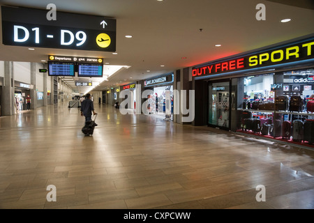 Ben Gurion (TLV) Airport, Israel. Duty-free shops and boarding signs. Stock Photo