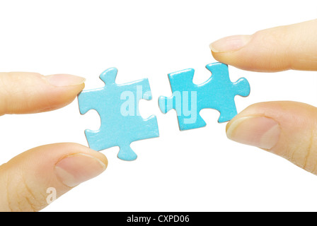 puzzle in hand isolated on white background Stock Photo - Alamy