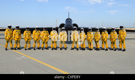 Fourteen US Air Force U-2 Dragon Lady Intelligence, Surveillance and Reconnaissance Aircraft instructor pilots from the 1st Reconnaissance Squadron pose for a photo in front of a two seat U-2S August 17, 2012 at Beale Air Force Base, California. Fewer people have piloted the U-2 than have earned Super Bowl rings. Stock Photo