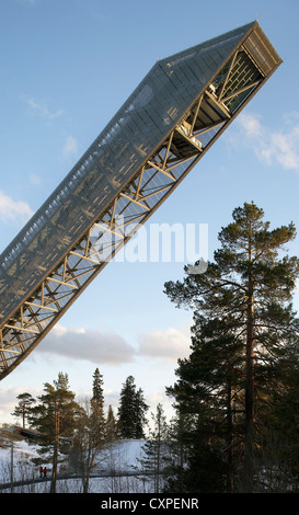 Holmenkollen Ski Jump, Holmenkollen, Norway. Architect: JDS Architects, 2011. View of jump at sunset. Stock Photo