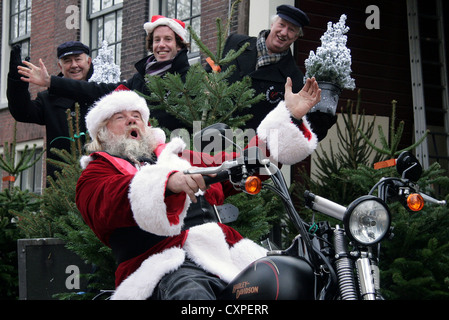 Santa Claus sitting on a Harley Davidson,Harley-Davidson.ho ho ho Stock Photo