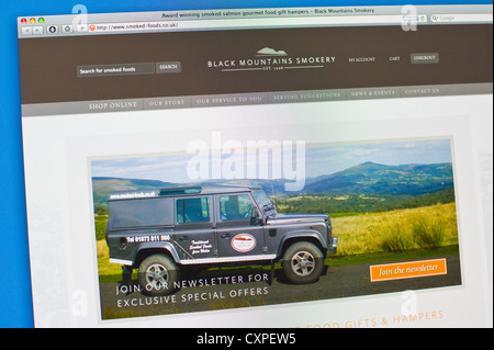 Black Mountain Smokery website featuring Land Rover Defender 110 Stock Photo