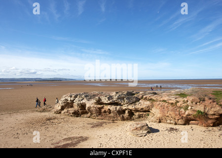 West Kirby beach on the River Dee estuary looking towards Hilbre Island, Wirral UK Stock Photo