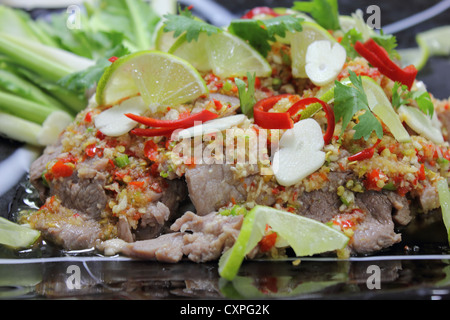 beef spicy green salad Decorate with lemon Stock Photo