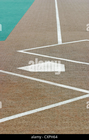 Looking down a baseball field from behind home plate Stock Photo