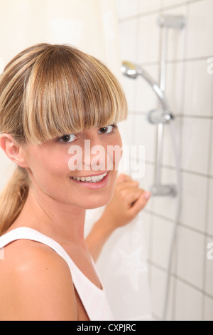 Blond teenager shower Stock Photo - Alamy