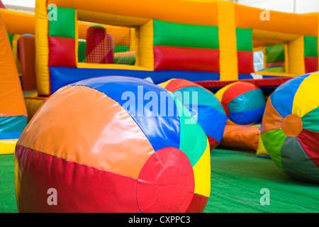 Colored balls and toys in a children play center Stock Photo