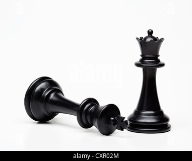 Chess queen and king piece, king fallen Stock Photo