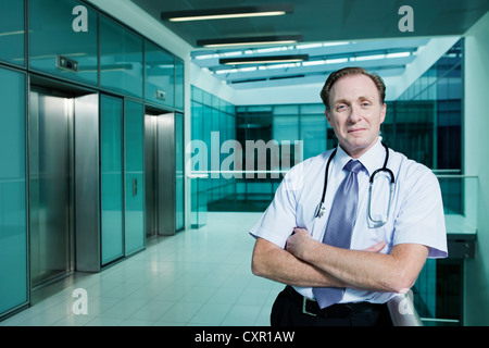 Portrait of doctor with arms folded Stock Photo
