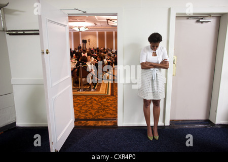 First Lady Michelle Obama waits to be introduced during an event at the Claremont Hotel Club & Spa June 14, 2011 in Berkeley, California. Stock Photo