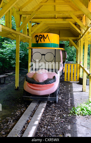 Morbid charm of an abandoned funfair ride in the former Spreepark Berlin amusement park, formerly known as Kulturpark Stock Photo