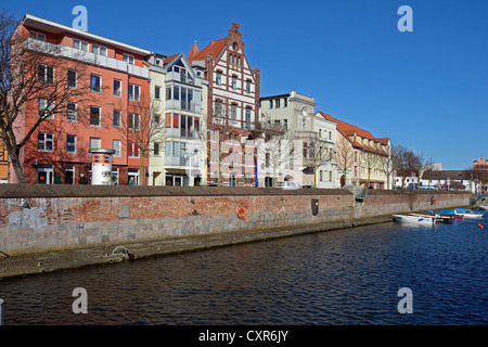 View of old brick buildings at Stralsund harbour as seen from Querkanal channel, UNESCO World Heritage site Stock Photo