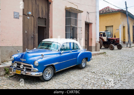 Restored American classic car in the historic district, Trinidad, Cuba, Central America Stock Photo
