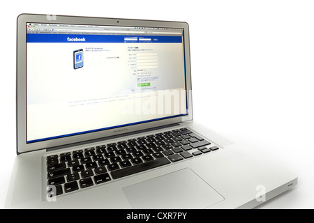 Japanese language version of Facebook, social networking website displayed on the screen of an Apple MacBook Pro Stock Photo