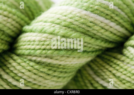 Detail of hank of green wool yarn Stock Photo