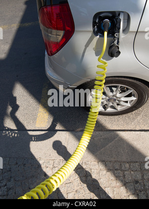 Charging cable for an electric car, Mercedes A Class E-Cell, main train station, Berlin, Germany, Europe Stock Photo