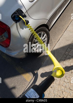 Charging cable for an electric car, Mercedes A Class E-Cell, main train station, Berlin, Germany, Europe Stock Photo