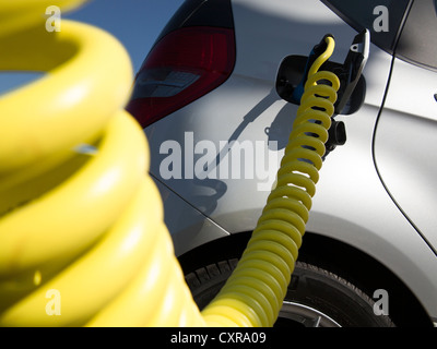 Charging cable for an electric car, Mercedes A Class E-Cell, main train station, Berlin, Germany, Europe Stock Photo