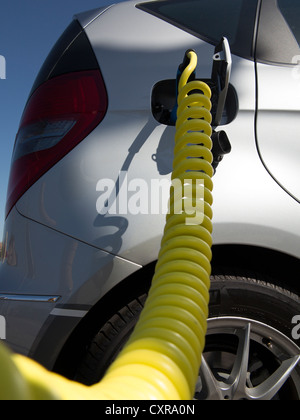 Charging cable for an electric car, Mercedes A Class E-Cell, main train station, Berlin, Germany, Europe Stock Photo