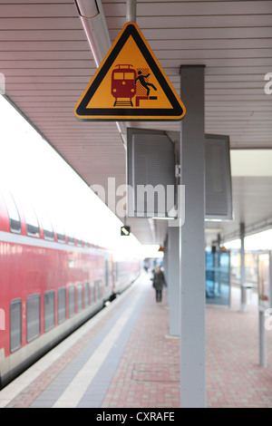 Platform with a warning sign, Koeln Ehrenfeld railway station, North Rhine-Westphalia, Germany, Europe Stock Photo