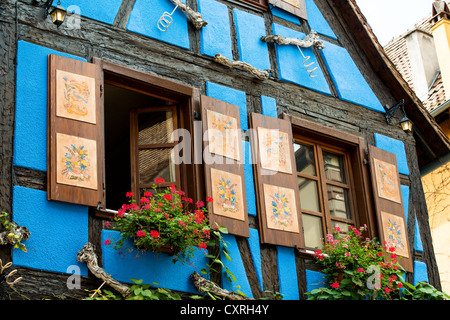 Historic old blue house in town of Riquewihr voges, France.