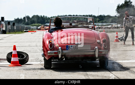 Red MG Convertible Road Runer at the starting line, Road Runner Race 61 in Finowfurt, Brandenburg, Germany, Europe Stock Photo