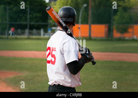 Baseball player hitting ball, Berlin, Germany, Europe Stock Photo