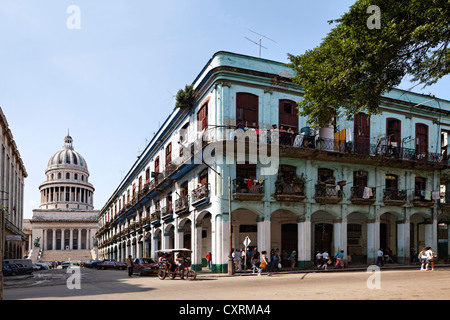 El Capitolio or National Capitol Building, dilapidated facade with balconies, street, passers-by, La Habana, Havana Stock Photo