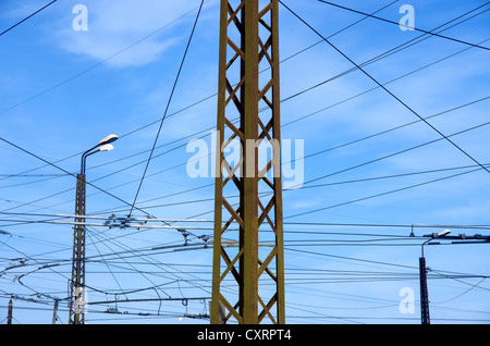Power wires and cables with blue sky background Stock Photo