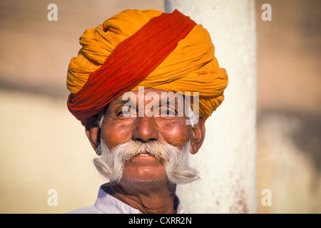 Indian man about 60 years old, servant wearing a uniform and a turban, Mandawa Castle, Shekhawati, Rajasthan, northern India