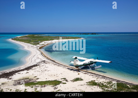 dehaviland dhc-3 otter seaplane on the beach and bush key at the dry tortugas florida keys usa Stock Photo