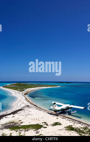 dehaviland dhc-3 otter seaplane on the beach and bush key at the dry tortugas florida keys usa Stock Photo