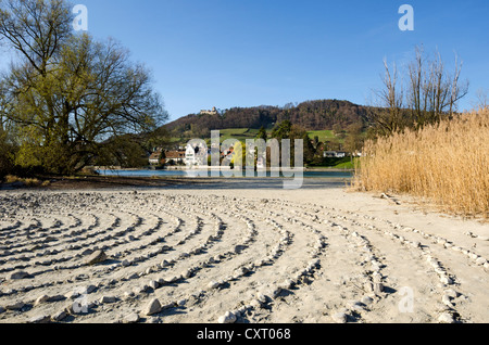 Stone labyrinth on Werd island, can be used for meditation, the historic district of Stein am Rhein and Hohenklingen Castle at Stock Photo