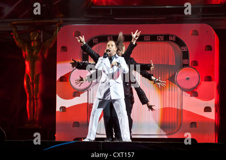Swiss singer Rene Baumann alias DJ Bobo singing live at his Dancing in Las Vegas show, SwissLife Arena, Lucerne, Switzerland Stock Photo