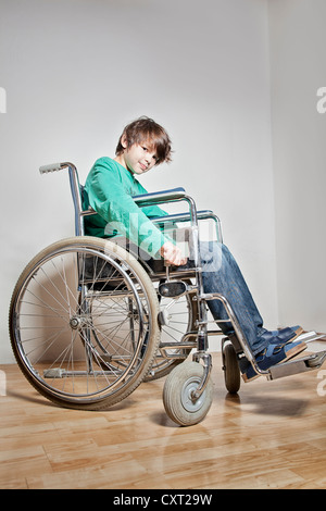 Boy in a wheelchair Stock Photo