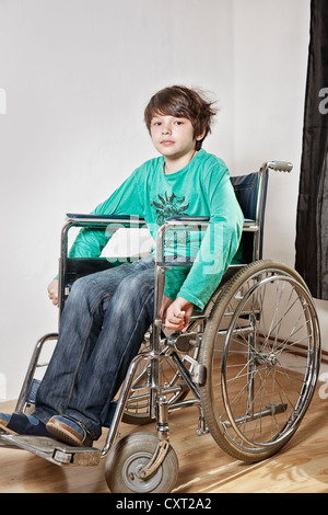 Boy in a wheelchair Stock Photo