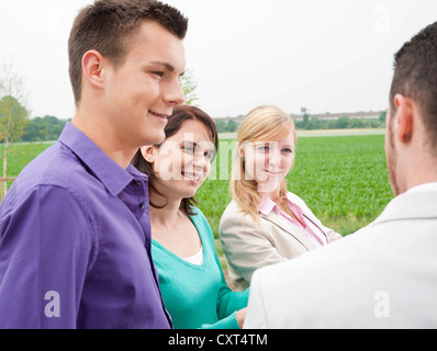 Young people having a discussion Stock Photo