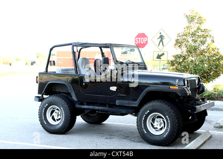 Black Jeep in a parking lot in Davenport Florida, USA Stock Photo