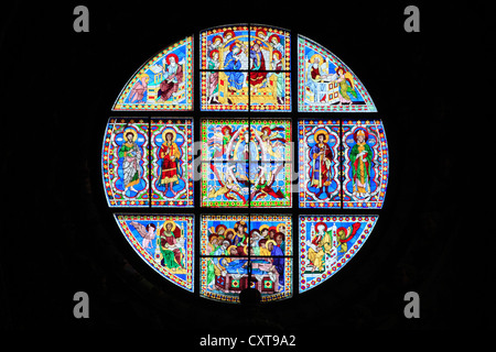 Rose window, round window in the wall of the choir, the oldest stained glass picture in Italy created in 1287, Siena Cathedral Stock Photo