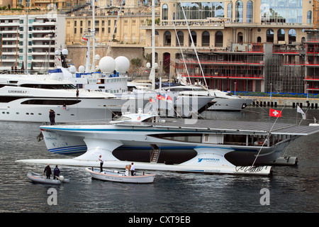 Tûranor PlanetSolar, solar-powered boot arriving in Monaco after the first circumnavigation of the globe with solar power Stock Photo