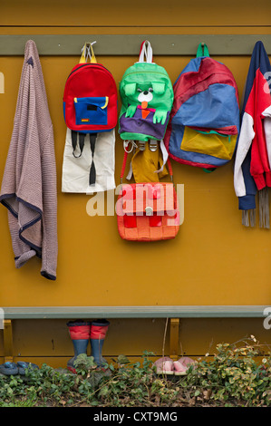 School wardrobe with backpacks, bags, jackets at the Easter bunny school at Easter time, Niederneuching-Ottenhofen Stock Photo