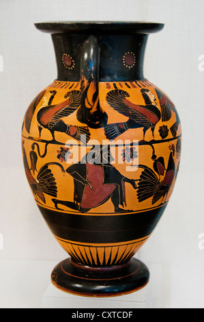 Ancient Greek Attic black-figure neck-amphora jar depicting a running bearded man flanked by sirens, circa 540 B.C. Stock Photo